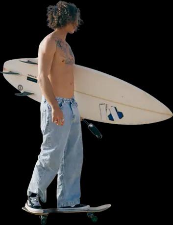 Person carrying a surfboard